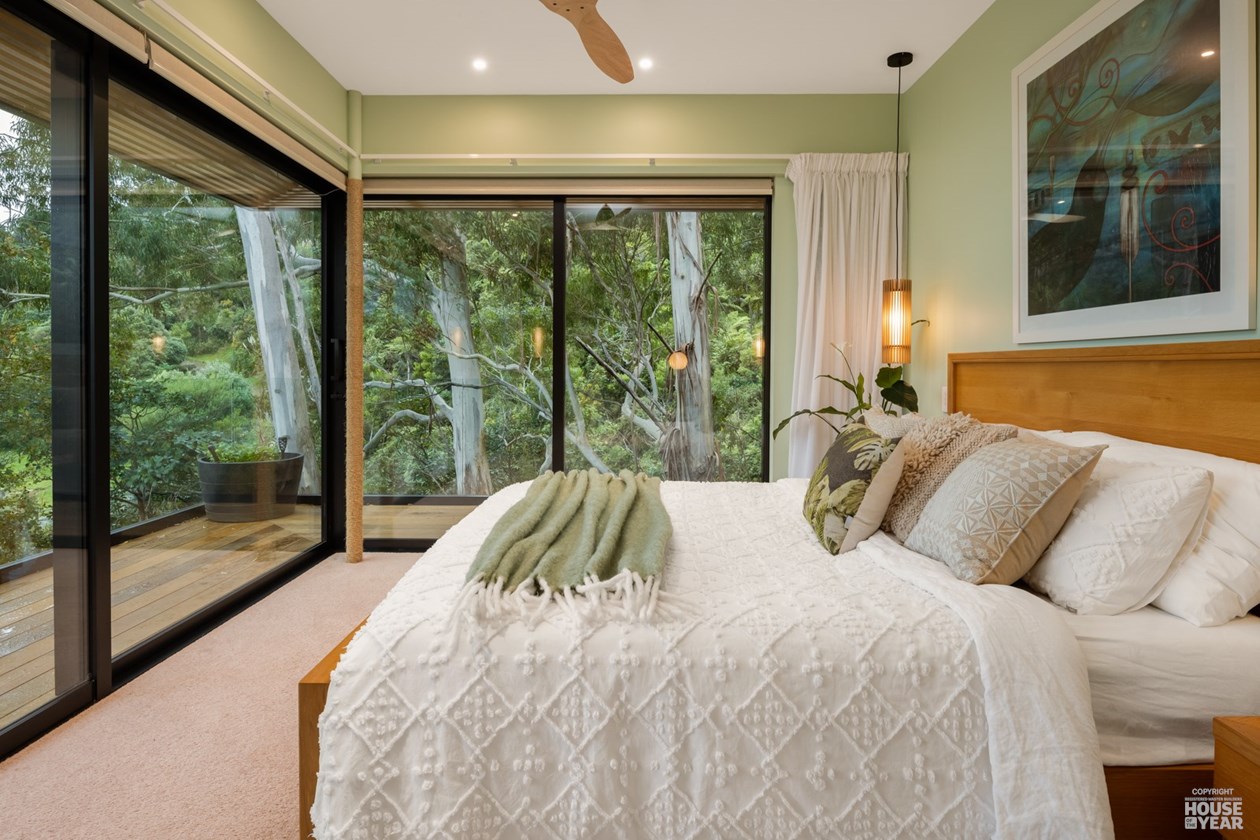 Woodland Escape — Bedroom with bush views
