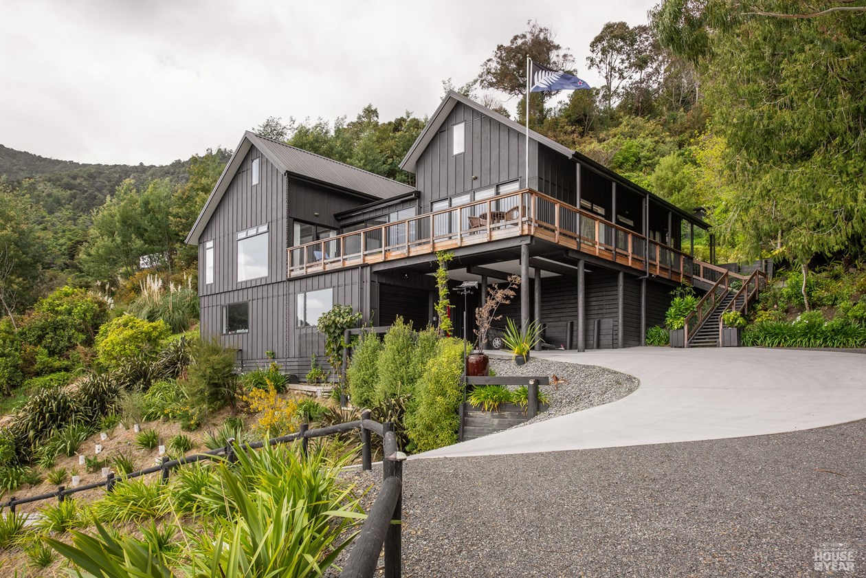 Picton Hillside New Build — Exterior with hillside garden